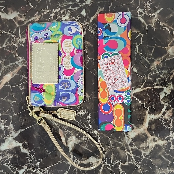Coach Poppy wristlet & 12 pencils. - Picture 1 of 12
